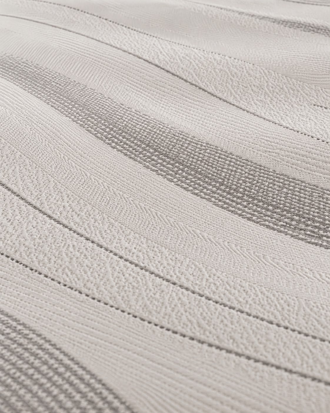 Tela de punto con ondas fluidas bicolor plata y blanco Goldtex